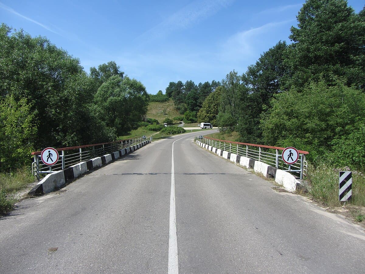 Liškiava Monastery perched above the Nemunas River surrounded by forest