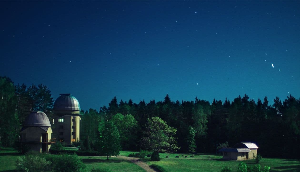 Dome of the Molėtai Astronomical Observatory under a starry sky