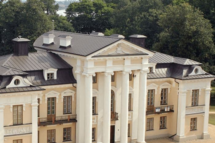 Neoclassical facade of Paežeriai Manor with Ionic columns