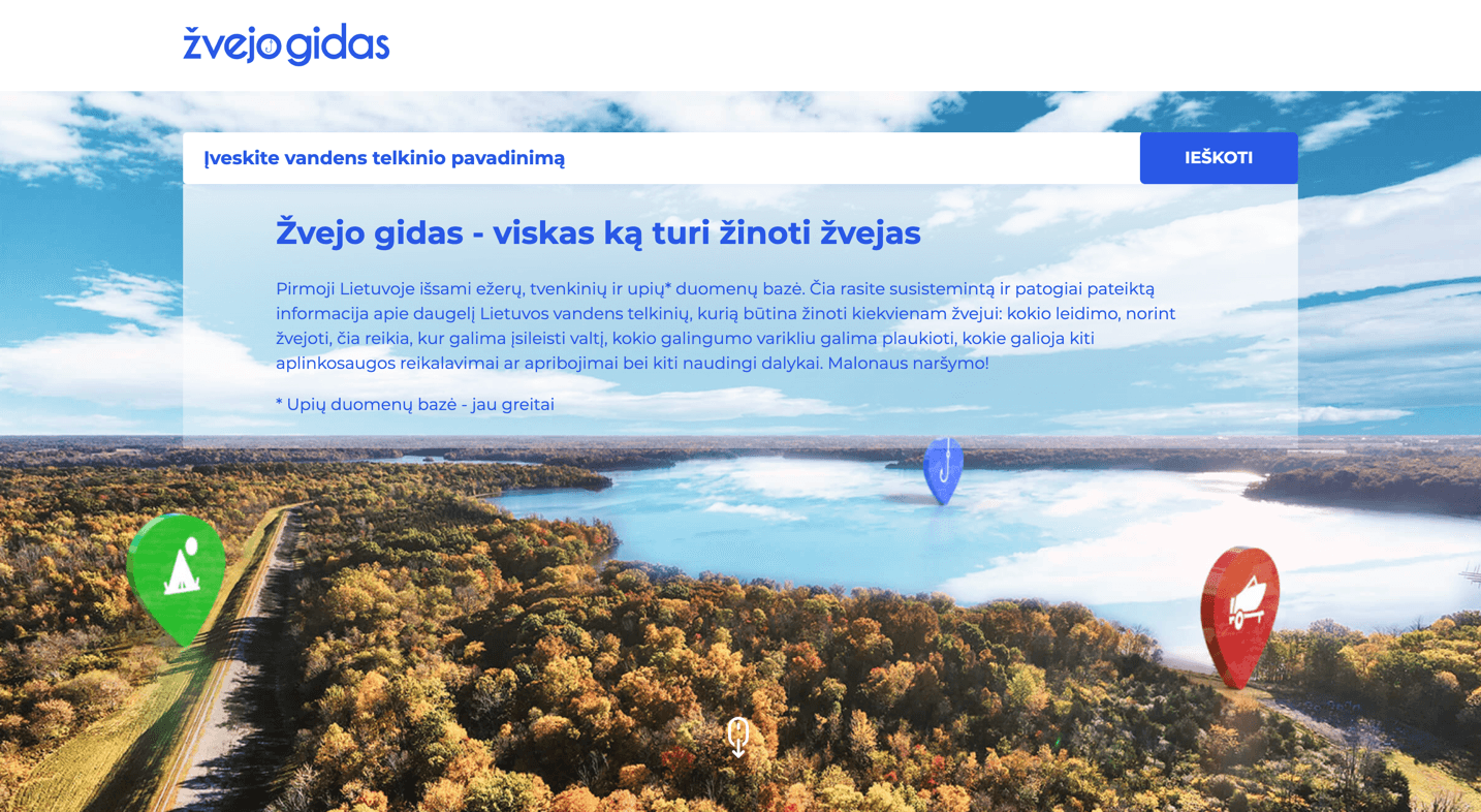 Sandy shore of Rubikiai Lake surrounded by pine forests