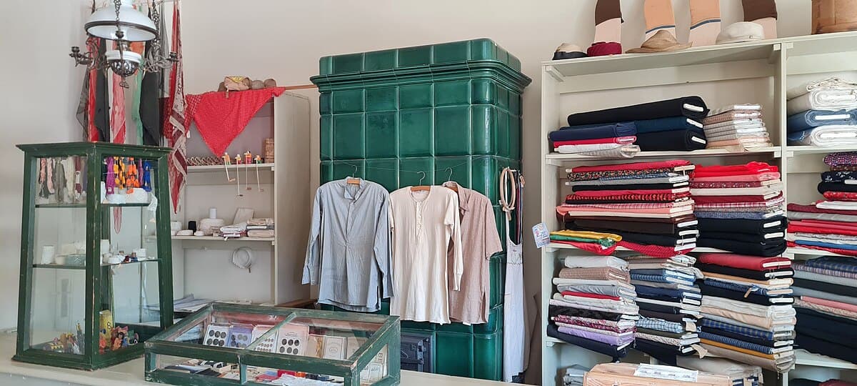 Traditional Lithuanian farmstead with thatched roof at Rumšiškės Open-Air Museum