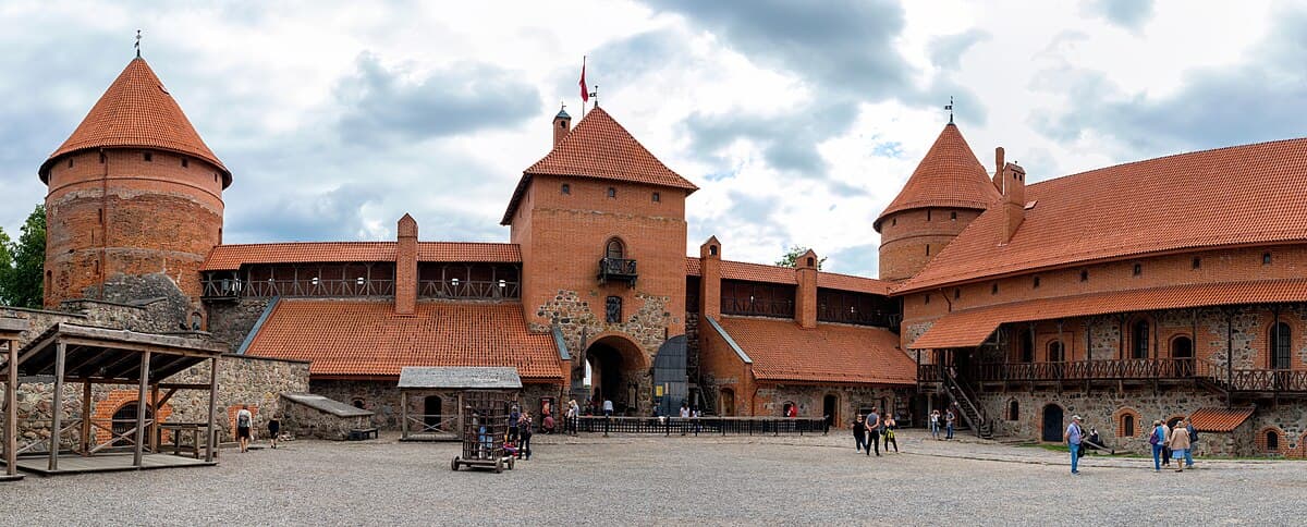 Red-brick Trakai Island Castle surrounded by the waters of Lake Galvė