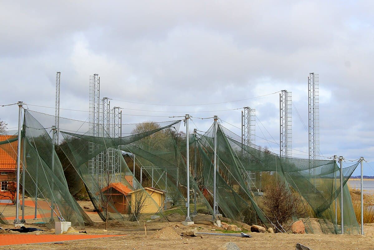 Ventės Ragas lighthouse with Heligoland bird traps in the foreground